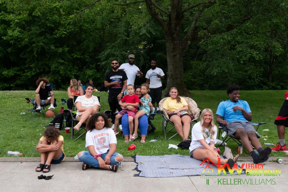 People gather for food and to enjoy basketball tournament held at the Juneteenth Freedom Day Celebration Sunday, June 19, 2022. Food was provided by event organizer Zaurice Stephens and his family, Stephens said.