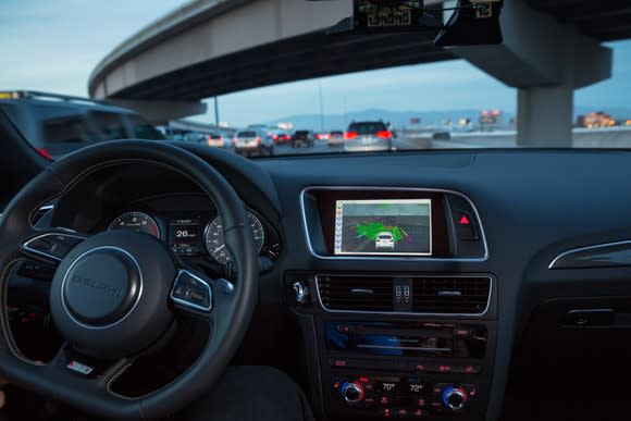 Heads Up Display of driverless vehicle sensing technology in vehicle interior.