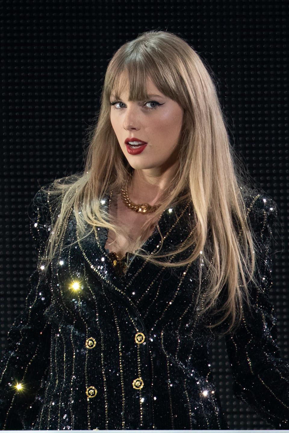 Taylor Swift  is seen here performing onstage on the first night of her "Eras Tour" at AT&T Stadium in Arlington, Texas, on March 31, 2023.