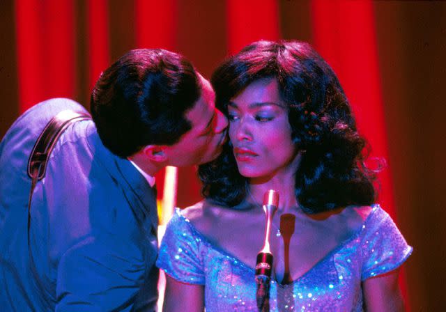 <p>Moviestore/Shutterstock</p> Laurence Fishburne and Angela Bassett in <em>What's Love Got To Do With It</em> (1993)