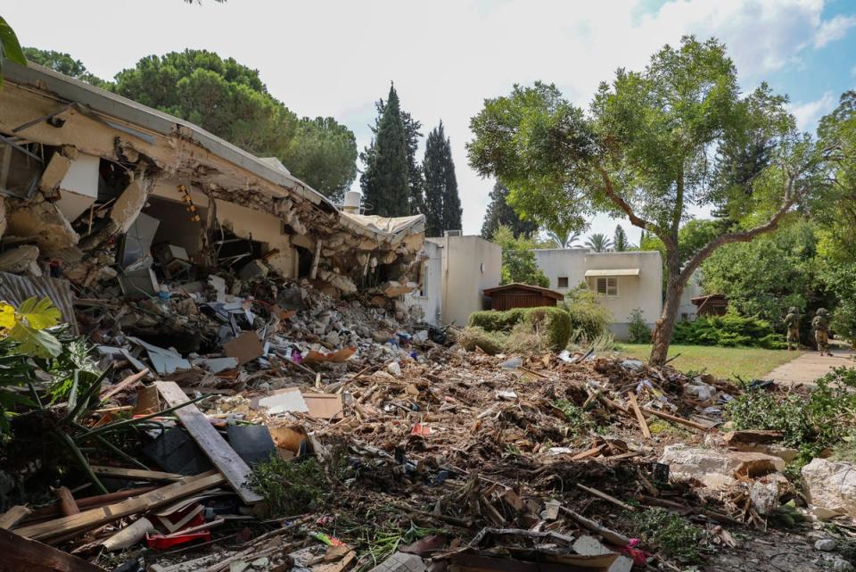 The destruction in Kfar Aza (Bel Trew/The Independent)