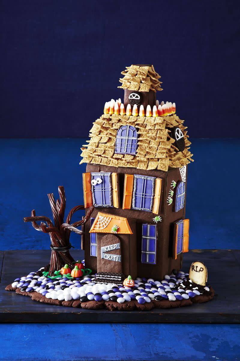 <p>Why wait until Christmas to make a cookie house? This haunted cookie house also includes an assortment of cookies, candies, and chocolate.</p><p><em><strong><strong><em><a href="https://www.womansday.com/food-recipes/food-drinks/g1658/halloween-haunted-cookie-house/" rel="nofollow noopener" target="_blank" data-ylk="slk:Get the Haunted Gingerbread House recipe.;elm:context_link;itc:0;sec:content-canvas" class="link ">Get the Haunted Gingerbread House recipe. </a></em></strong></strong></em></p>