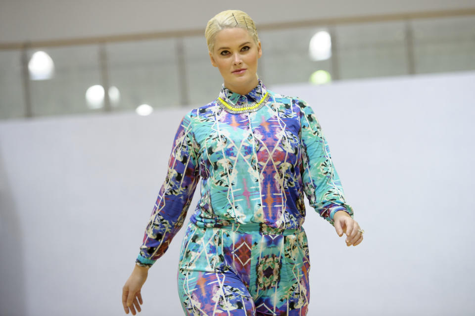 CORRECTING IDENTITY OF MODEL TO WHITNEY THOMPSON - Model Whitney Thompson wears a design during the Plus Size Fashion event during London Fashion Week Autumn/Winter 2014, at Vinopolis in central London, Friday, Feb. 14, 2014. (Photo by Jonathan Short/Invision/AP)