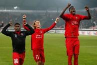 Football Soccer - FC Midtjylland v Manchester United - UEFA Europa League Round of 32 First Leg - MCH Arena, Herning, Denmark - 18/2/16 FC Midtjylland's Paul Onuachu celebrates after the match with Marco Urena and Kristoffer Olsson Action Images via Reuters / Paul Childs Livepic EDITORIAL USE ONLY.