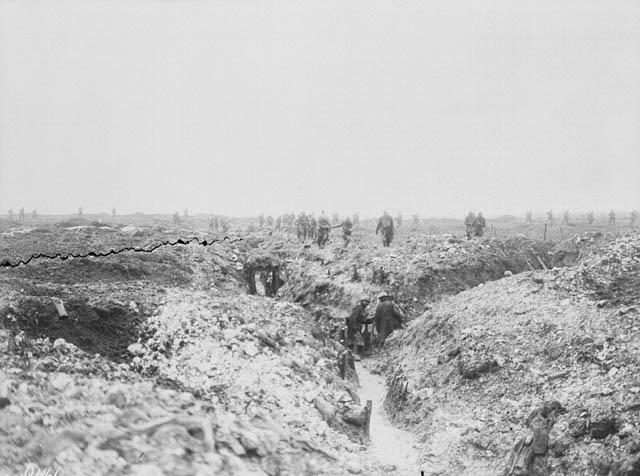 <p>Canadian soldiers search captured German trenches for hiding soldiers during the Battle of Vimy Ridge in April 1917. Photo from Library and Archives Canada. </p>