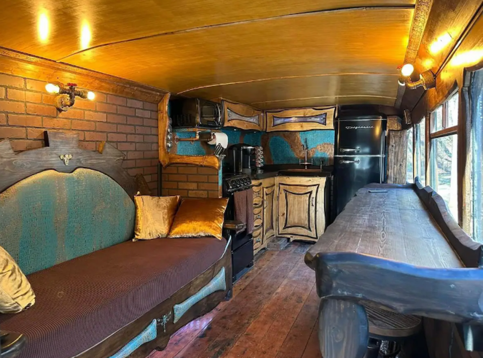 The MidKnight Bus Airbnb has a queen bed, two twin beds to comfortably sleep four.