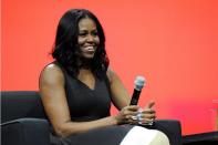 <p>Michelle Obama si è sempre posta un budget molto basso per i suoi abiti; in un’apparizione alla NBC indossava un vestito H&M da 35 dollari.(Getty) </p>