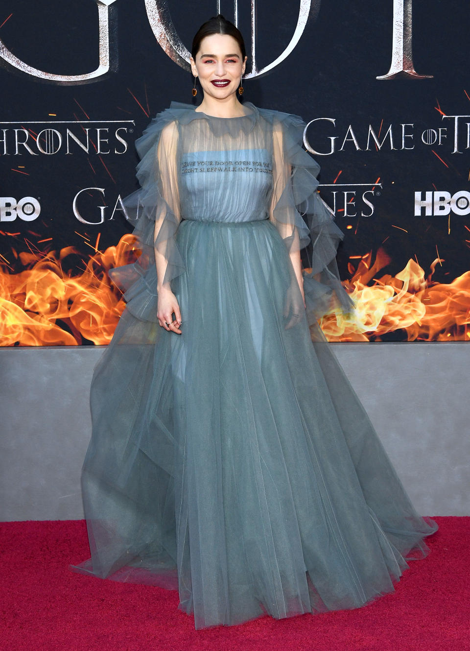 <p>Emilia Clarke proved she’s the Queen of the red carpet in sheer Valentino ruffles. <em>[Photo: Getty]</em> </p>