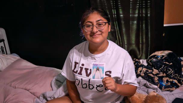 PHOTO: Jazmin Cazares holds a photo of her sister, Jackie, who was killed at Robb Elementary School in Uvalde, Texas. (Kat Caulderwood/ABC News)
