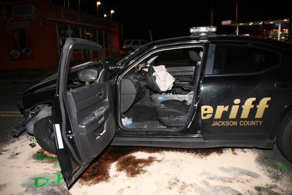 A photo from a police investigative file shows damage to a Jackson County Sheriff’s Office vehicle after the crash in 2017.