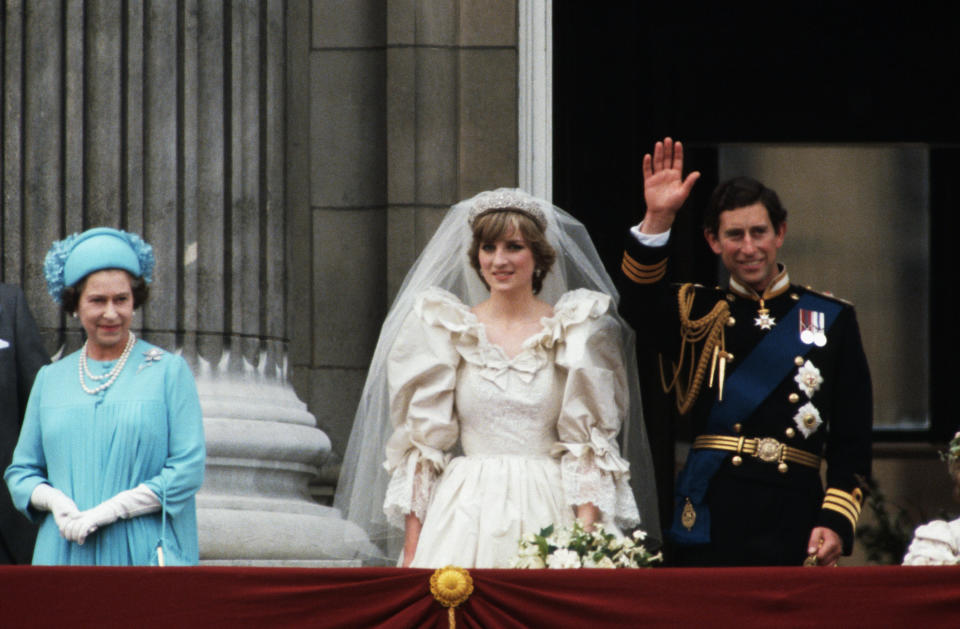 Newlyweds Prince Charles and Lady Diana with Queen Elizabeth at Buckingham Palace after the ceremony. (Photo: Wally McNamee via Getty Images)