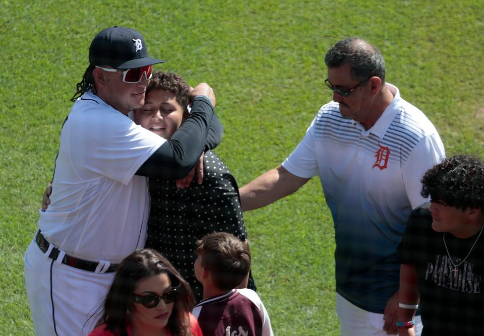 Detroit Tigers great Miguel Cabrera and his son Christopher Cabrera share a moment after the pregame ceremony that was honoring him as his father Miguel Cabrera Sr. stands nearby. Cabrera is playing in his next-to-last game against the Cleveland Guardians at Comerica Park in Detroit on Saturday, Sept. 30, 2023.