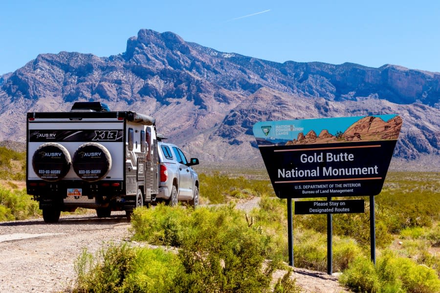 A motorist enters the Gold Butte National Monument near the Bundy ranch, Tuesday, April 9, 2024, in Bunkerville, NV. Ten years have passed since hundreds of protesters including armed riflemen answered a family call for help which forced U.S. agents and contract cowboys to abandon an effort to round up family cattle in a dispute over grazing permits and fees. Despite federal prosecutions, no family members were convicted of a crime. (AP Photo/Ty ONeil)