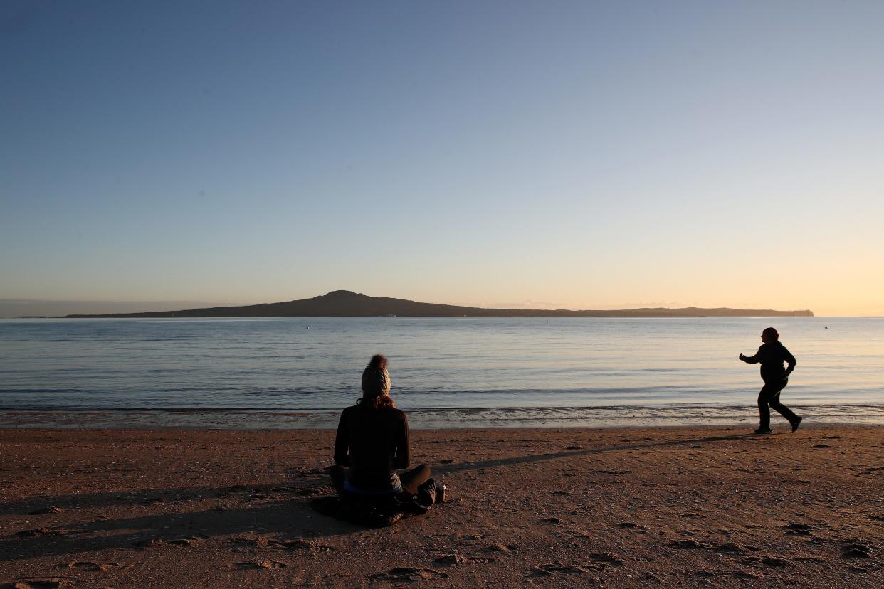 Sunrise on Kohimarama beach on August 13, 2020, in Auckland, New Zealand.