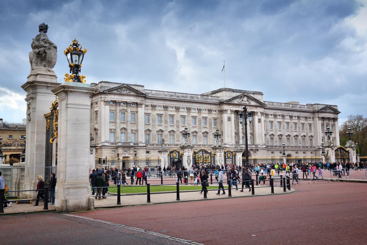 People visit Buckingham Palace in London, UK. London is the most populous city in the UK with 13 million people living in its metro area.