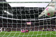 LONDON, ENGLAND - AUGUST 07: Javier Cortes of Mexico scores a goal past goalkeeper, Shuichi Gonda of Japan during the Men's Football Semi Final match between Mexico and Japan, on Day 11 of the London 2012 Olympic Games at Wembley Stadium on August 7, 2012 in London, England. (Photo by Julian Finney/Getty Images)