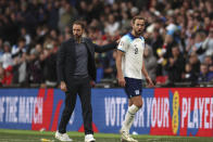 England's coach Gareth Southgate, left, salutes England's Harry Kane, as he leaves the pitch after being substituted during the Euro 2024 group C qualifying soccer match between England and Ukraine at Wembley Stadium in London, Sunday, March 26, 2023.(AP Photo/Ian Walton)