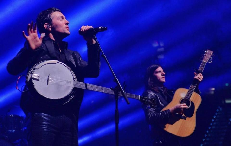 Scott Avett, left, and Seth Avett play the Avett Brothers’ annual New Year’s Eve show at Raleigh’s PNC Arena in 2017.