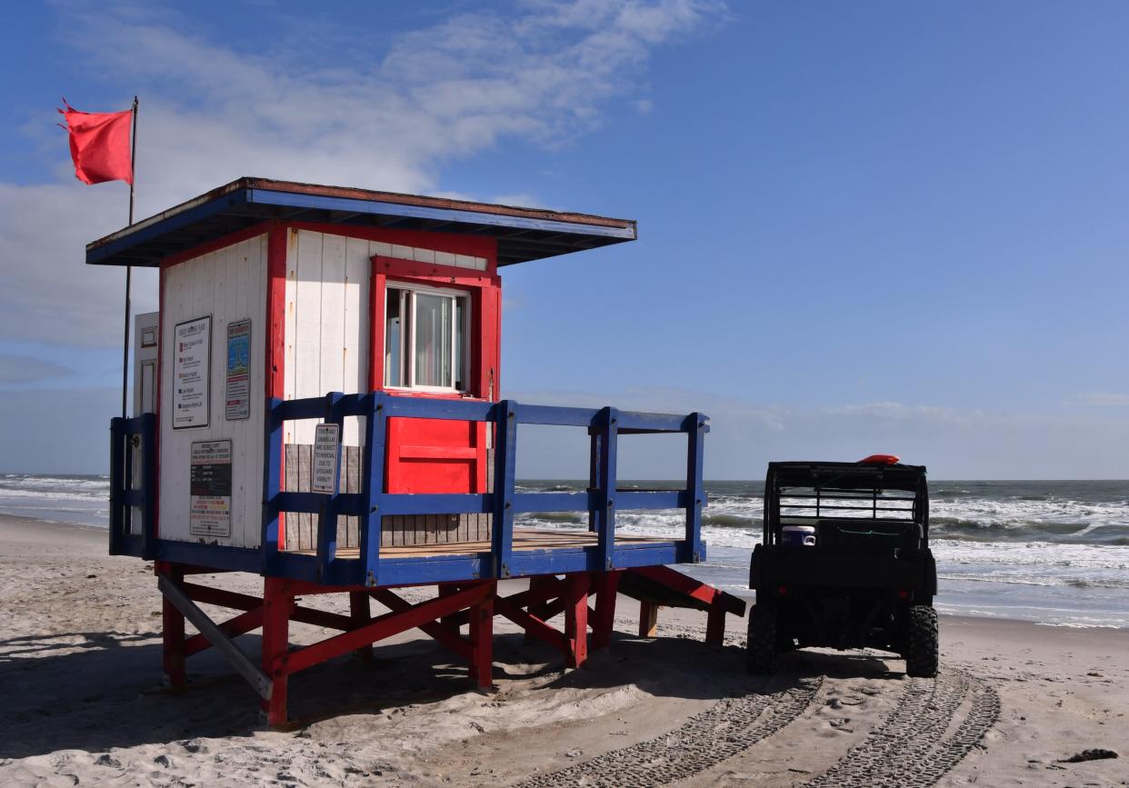 Brevard County Ocean Rescue lifeguards are flying the red flags warning of rip currents along the coast, with high winds and rough seas creating dangerous conditions through the weekend.