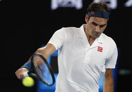 Tennis - Australian Open - Third Round - Melbourne Park, Melbourne, Australia, January 18, 2019. Switzerland's Roger Federer in action during the match against Taylor Fritz of the U.S. REUTERS/Aly Song