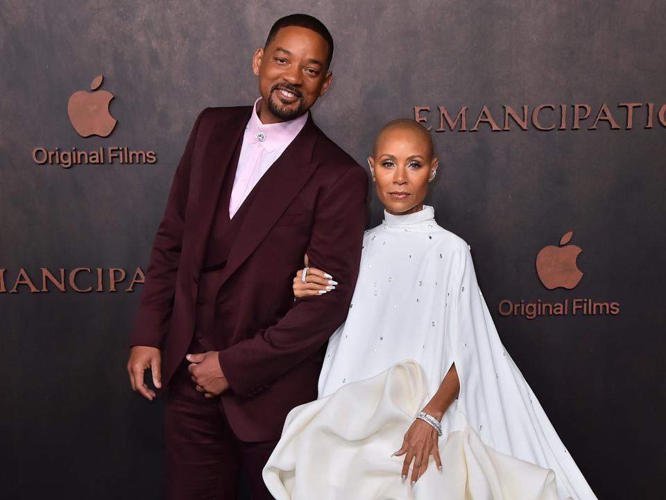 Will Smith, left, and Jada Pinkett Smith arrive at the premiere of "Emancipation," Wednesday, Nov. 30, 2022, at the Regency Village Theatre in Los Angeles.