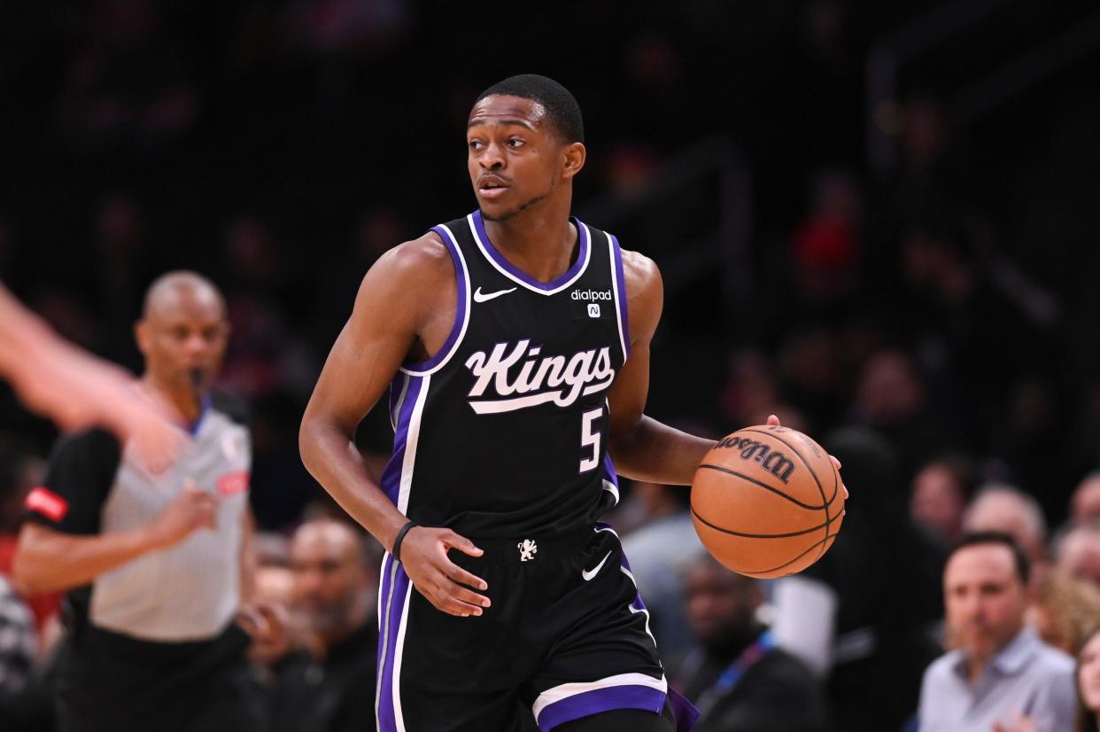 Mar 21, 2024; Washington, District of Columbia, USA; Sacramento Kings guard De'Aaron Fox (5) dribbles up the court during the first half against the Washington Wizards at Capital One Arena. Mandatory Credit: Tommy Gilligan-USA TODAY Sports