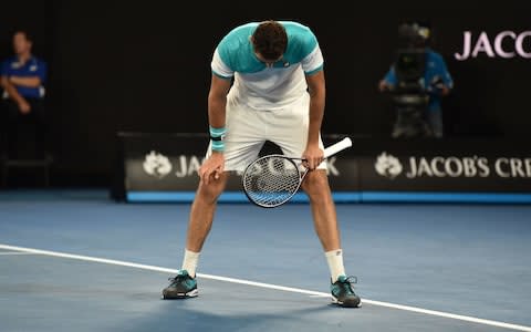 Cilic takes a moment to gather his breath - Credit: AFP