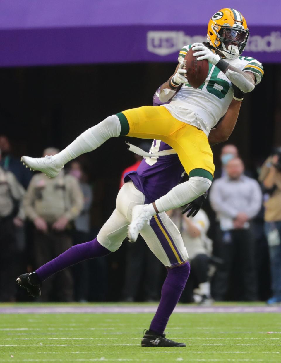 Green Bay Packers safety Darnell Savage (26) breaks up a pass intended for Minnesota Vikings wide receiver Justin Jefferson (18) during the fourth quarter of their game Sunday, November 21, 2021 at U.S. Bank Stadium in Minneapolis, Minn. It was originally ruled an interception before the call was overturned.The Minnesota Vikings beat the Green Bay Packers 34-31.