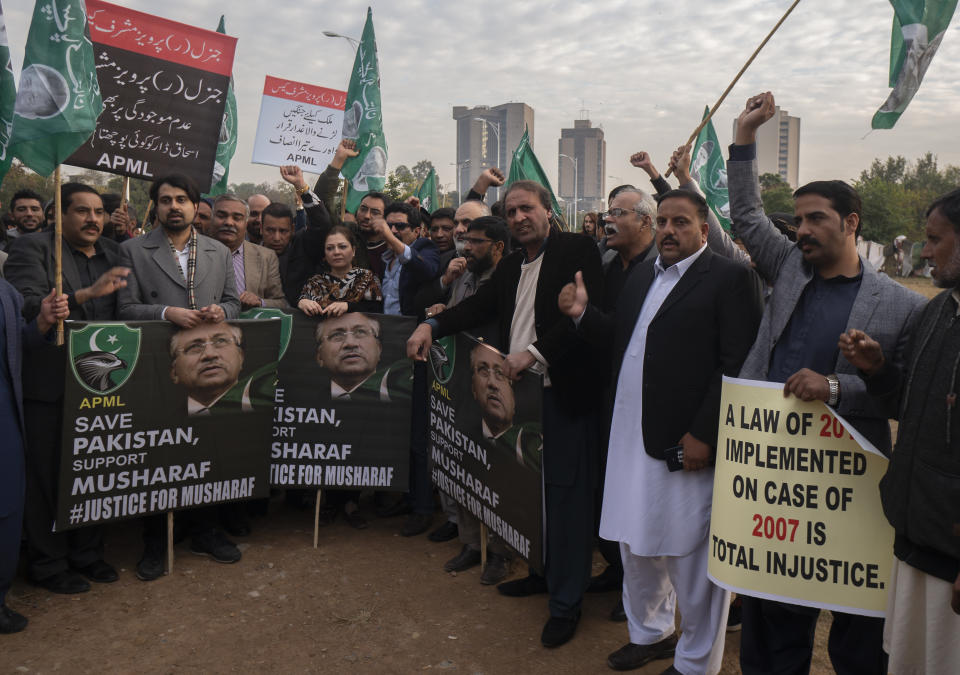 Supporters of former Pakistani military ruler Gen. Pervez Musharraf protest a court's decision, in Islamabad, Pakistan, Wednesday, Dec. 18, 2019. The Pakistani court sentenced Musharraf to death in a treason case related to the state of emergency he imposed in 2007 while in power, officials said. Musharraf who is apparently sick and receiving treatment in Dubai where he lives was not present in the courtroom. (AP Photo/B.K. Bangash)