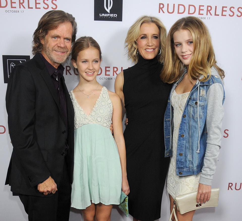 William H. Macy and Felicity Huffman with daughters Georgia and Sofia, right, at a screening of <i>Rudderless</i> in 2014. (Photo: Gregg DeGuire/WireImage)