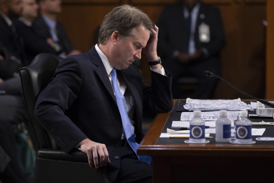 After more than an hour of delay over procedural questions, President Donald Trump's Supreme Court nominee, Brett Kavanaugh, waits to testify before the Senate Judiciary Committee for the third day of his confirmation hearing, on Capitol Hill in Washington, Thursday, Sept. 6, 2018. (AP Photo/J. Scott Applewhite)