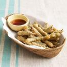 <p>These green beans are fried until they're crisp in tempura-like batter, making them the perfect, people-pleasing appetizer your family will devour in seconds. </p><p><em>Get the <a href="https://www.womansday.com/food-recipes/food-drinks/recipes/a36149/fried-green-beans-recipe-clv0711/" rel="nofollow noopener" target="_blank" data-ylk="slk:Fried Green Beans recipe;elm:context_link;itc:0;sec:content-canvas" class="link ">Fried Green Beans recipe</a>.</em></p>