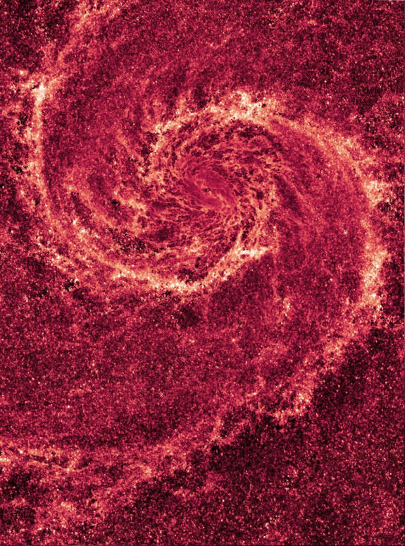 This image by the Hubble Space Telescope shows a dramatic view of the spiral galaxy M51, dubbed the Whirlpool Galaxy. Seen in near-infrared light, most of the starlight has been removed, revealing the Whirlpool's skeletal dust structure. This n