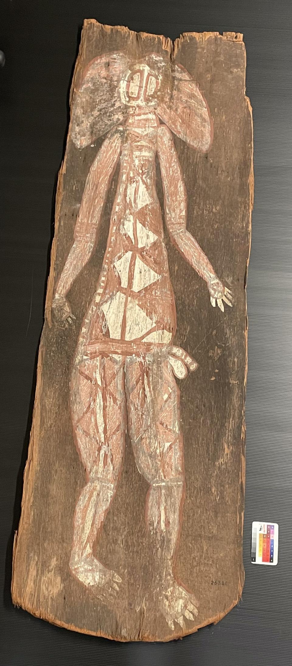 Bark painting of a male human-like figure that only ‘Old Harry’ could see according to Paddy Cahill, made in 1914 and part of the Spencer-Cahill Collection. Photograph by P. Taçon, Melbourne Museum, object 26381, object size 1.695m by 0.750m