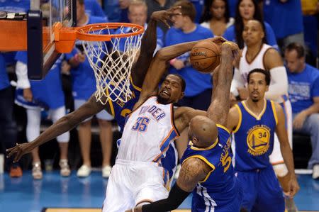 May 28, 2016; Oklahoma City, OK, USA; Oklahoma City Thunder forward Kevin Durant (35) is fouled by Golden State Warriors center Marreese Speights (5) during the fourth quarter in game six of the Western conference finals of the NBA Playoffs at Chesapeake Energy Arena. Mandatory Credit: Mark D. Smith-USA TODAY Sports