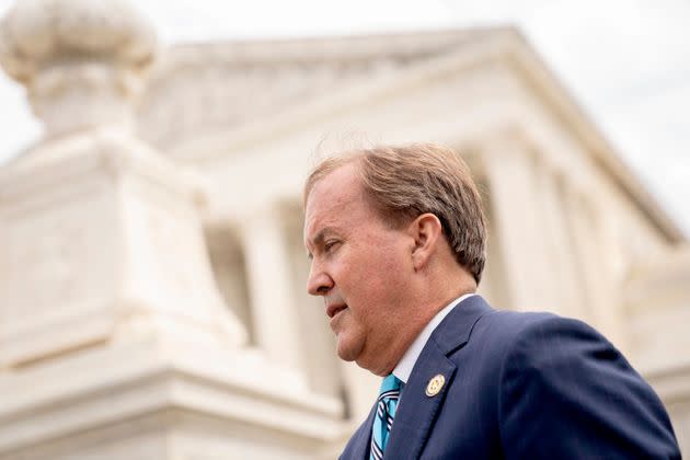 Texas Attorney General Ken Paxton speaks to reporters in front of the U.S. Supreme Court in Washington, D.C., on April 26, 2022.