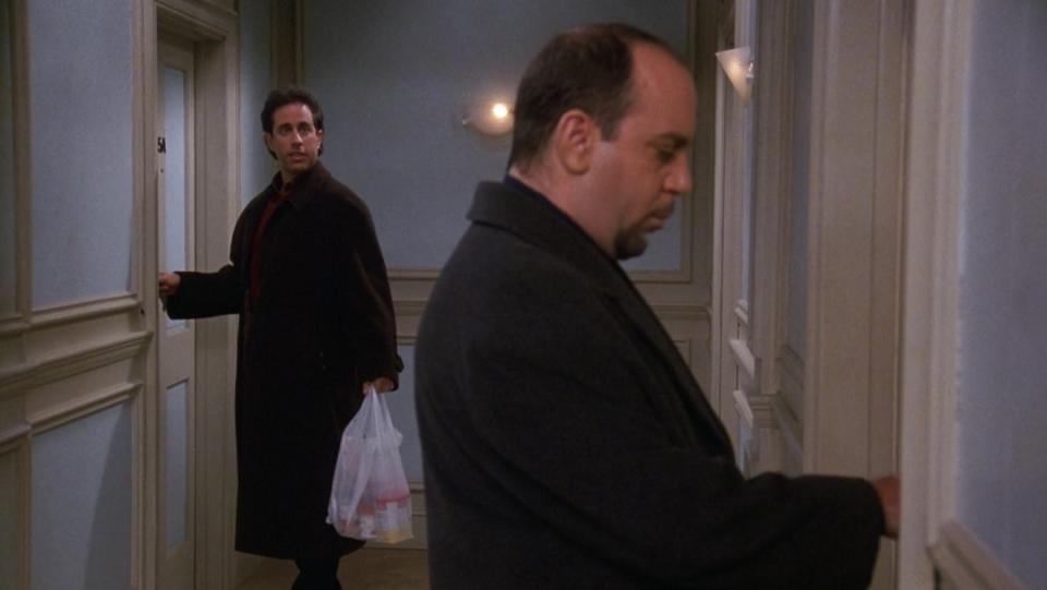 Jerry looks at his neighbor Phil down the hall on Seinfeld