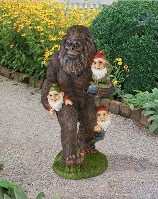 Bigfoot Carries Gnomes Statue