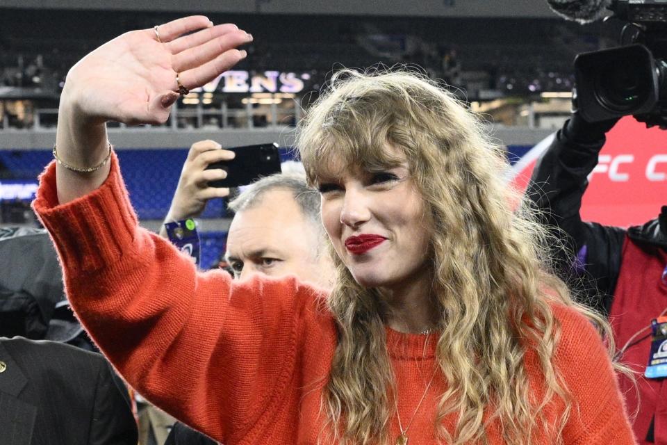 Taylor Swift waves after the AFC Championship NFL football game between the Baltimore Ravens and the Kansas City Chiefs, Sunday, Jan. 28, 2024, in Baltimore. (AP Photo/Nick Wass)