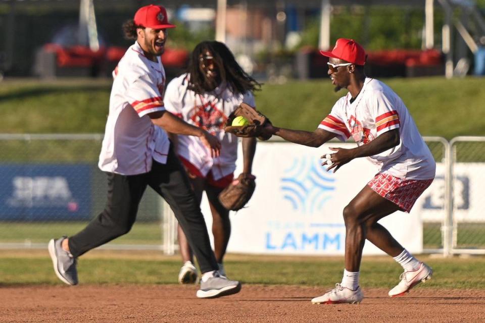 Kansas City Chiefs safety Nazeeh Johnson celebrates catching a fly ball during the Kansas City Charity Softball Game on June 6, 2024, at Legends Field in Kansas City, Kansas.