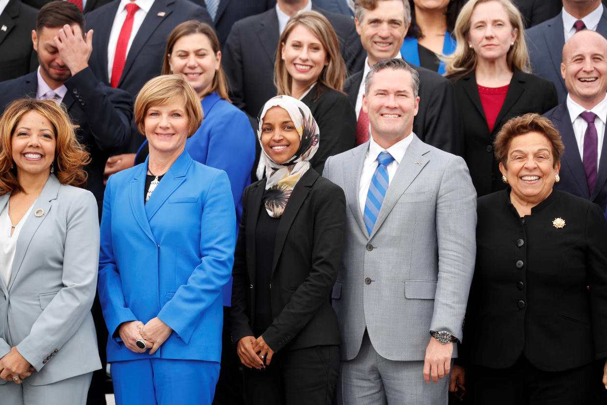 Ilhan Omar, front row center