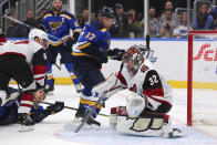 Arizona Coyotes goalie Antti Raanta (32) makes a save against St. Louis Blues forward Jaden Schwartz (17) during the second period of an NHL hockey game Thursday, Feb. 20, 2020, in St. Louis. (AP Photo/Dilip Vishwanat)