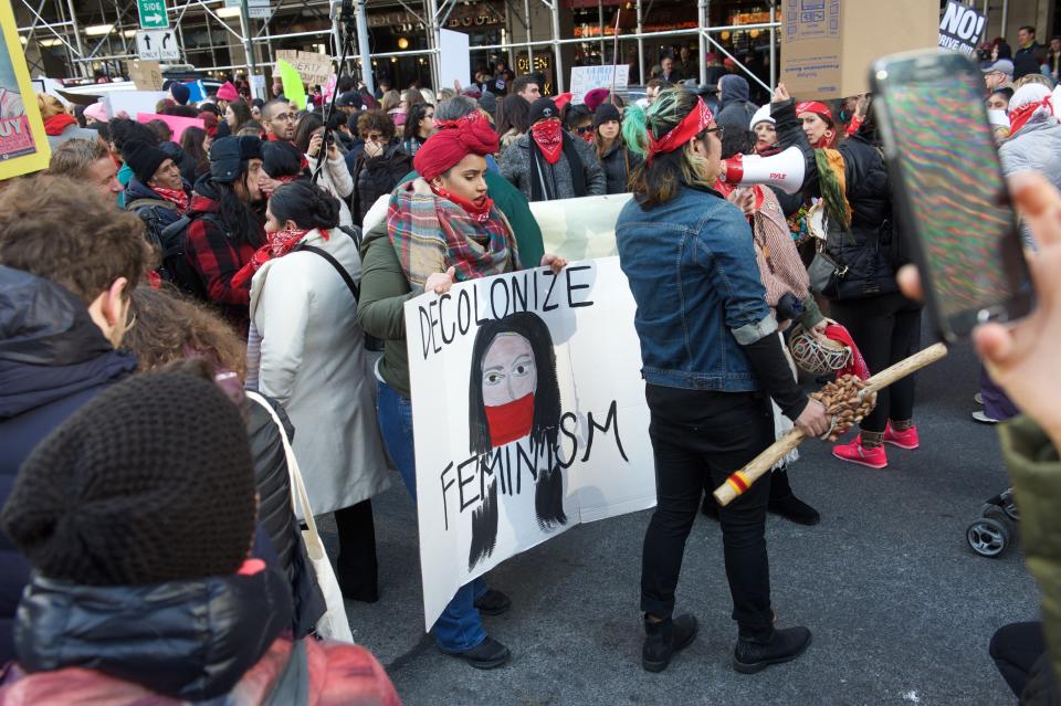 Veronica Pazmino, 28, wore red&nbsp;at the NYC Women's March to honor indigenous women. (Photo: Alanna Vagianos/HuffPost)