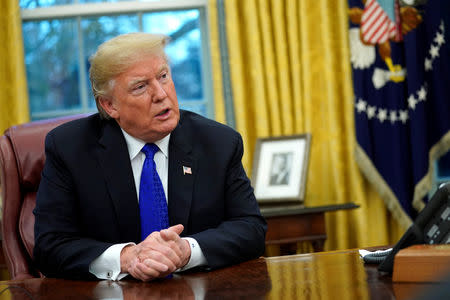 U.S. President Donald Trump sits for an exclusive interview with Reuters journalists in the Oval Office at the White House in Washington, U.S. December 11, 2018. REUTERS/Jonathan Ernst