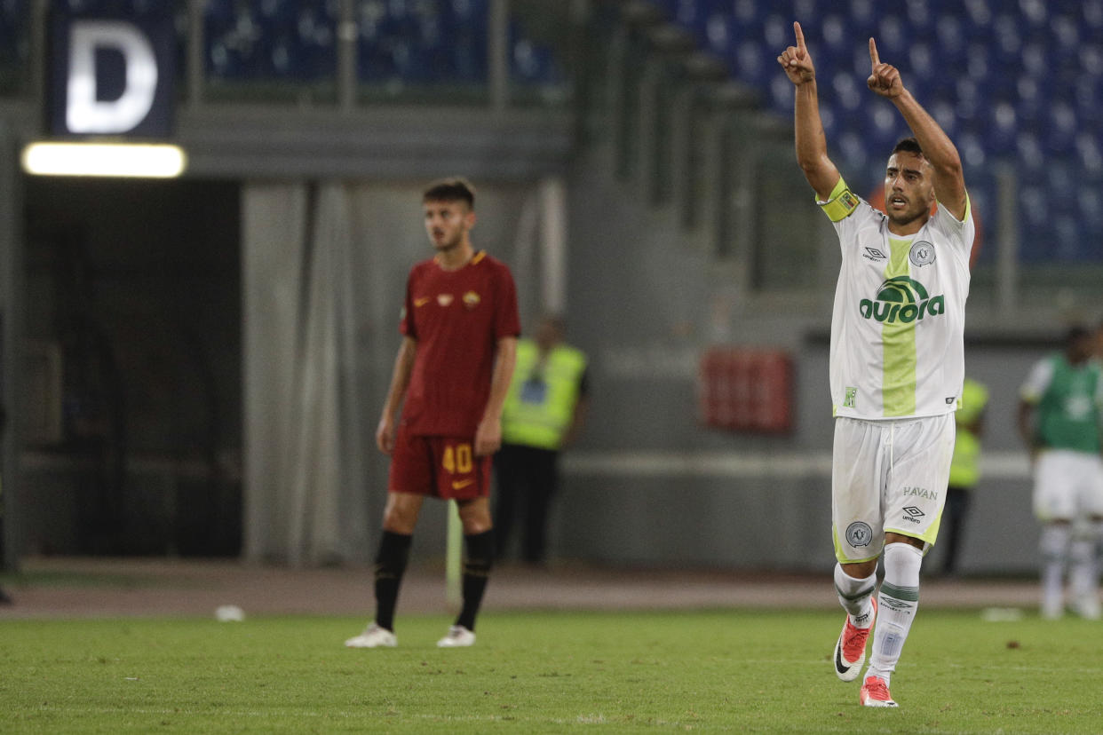 Chapecoense’s Alan Ruschel celebrates after scoring during a charity soccer match against Roma at Rome’s Olympic stadium, Friday, Sept. 1, 2017. The Brazilian soccer club was devastated by an airplane crash in the mountains of Colombia last Nov. 2016.(AP Photo/Gregorio Borgia)