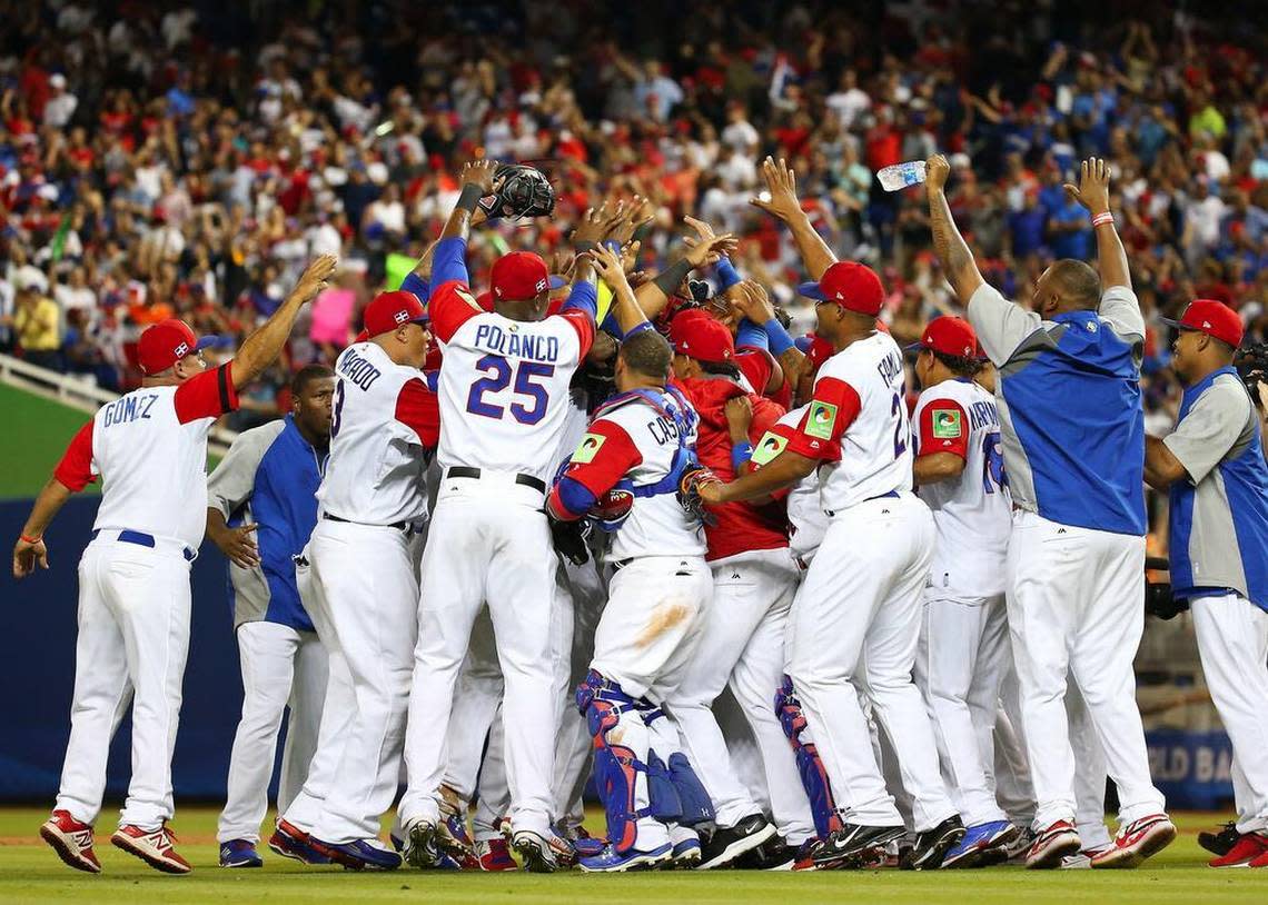 Dominican Republic players celebrate after defeating the United States 7-5 during the World Baseball Classic first round Pool C game at Marlins Park on Saturday, March 11, 2017, in Miami.