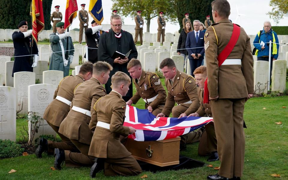 Soldiers carried Lance Corporal Robert Cook's, coffin, which was draped in the Union flag - Gareth Fuller/PA Wire