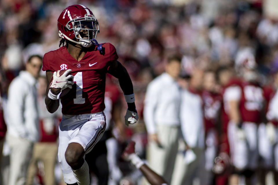 Alabama wide receiver Jameson Williams (1) runs down the sideline on a long pass reception against New Mexico State during the first half of an NCAA college football game, Saturday, Nov. 13, 2021, in Tuscaloosa, Ala. (AP Photo/Vasha Hunt)