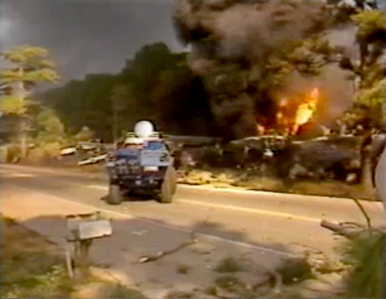 Image: Flames and smoke rise from the Livingston, La., train derailment in 1982. (Environmental Protection Agency)