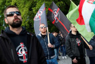 Members of far-right, nationalist groups attend a protest against criminal attacks caused by youth, in Torokszentmiklos, Hungary, May 21, 2019. REUTERS/Bernadett Szabo